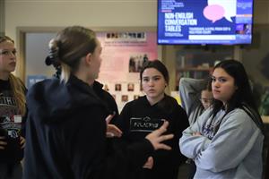 Girl listening to UNK tour guide